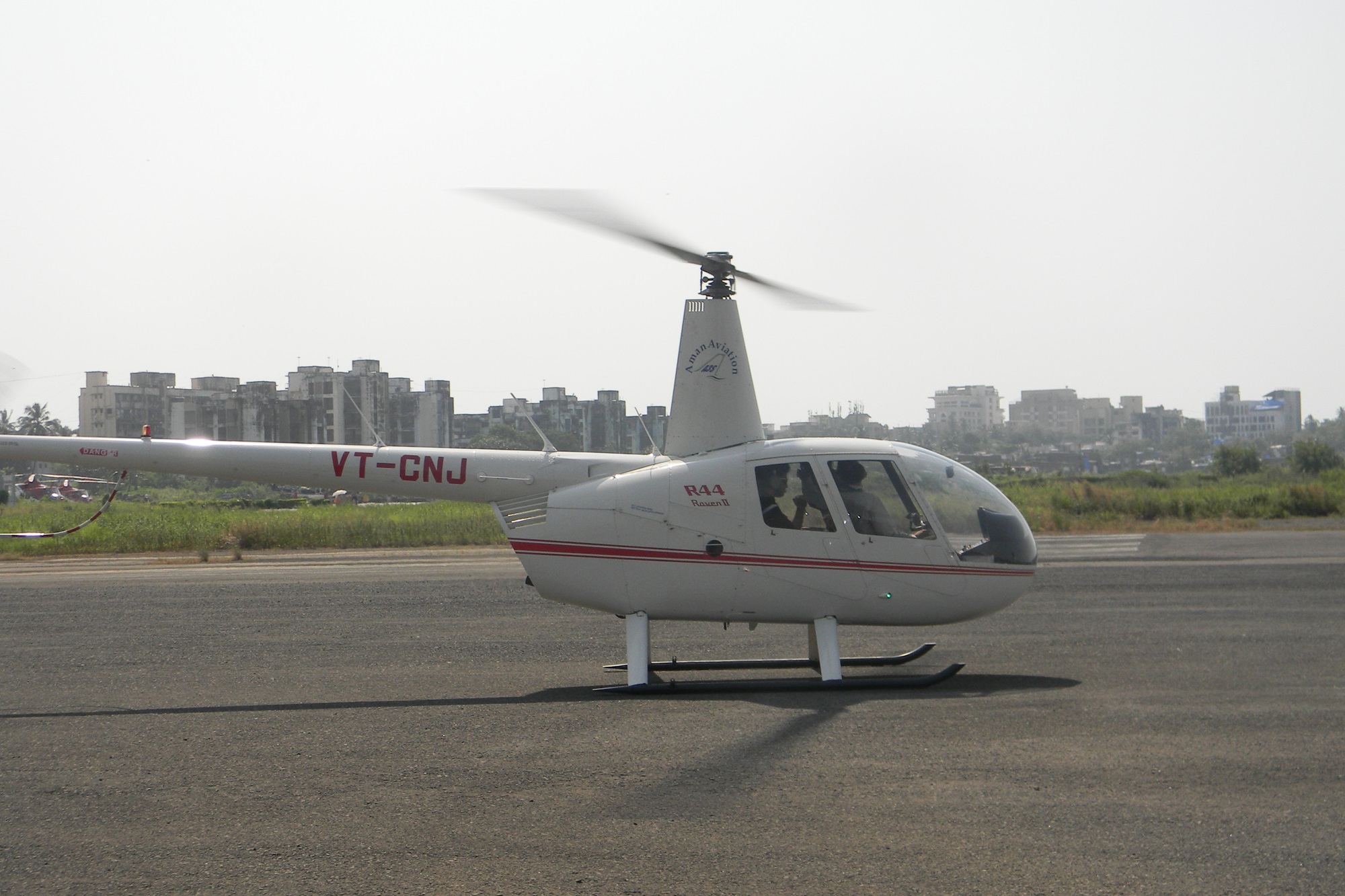 Robinson R44 helicopter in flight